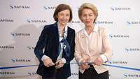 Parly und von der Leyen schneiden Band durch