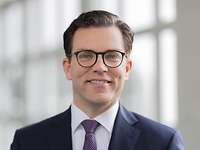 Jan-Simon Dörflinger looks friendly into the camera.